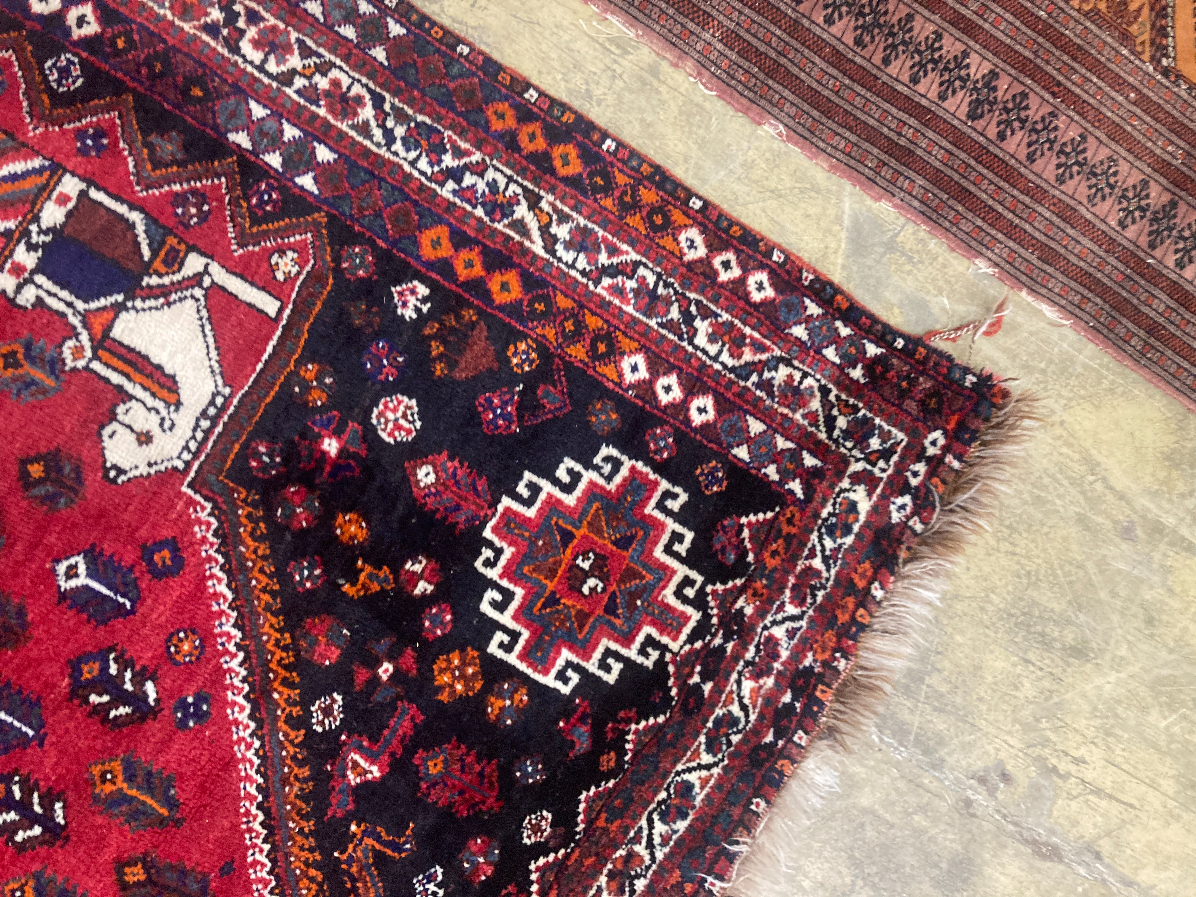 An Iranian carpet, 256 x 184cm